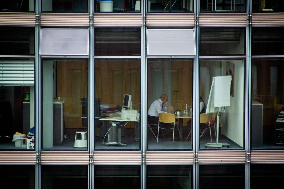 A person working alone late in an office